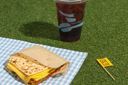 JUST Egg™ Roasted Tomato & Pesto Flatbread, available now for a limited time at Caribou Coffee